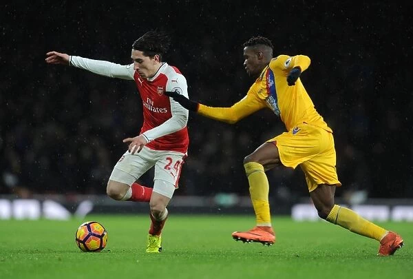 Arsenal's Hector Bellerin Faces Off Against Crystal Palace's Wilfred Zaha in Premier League Clash