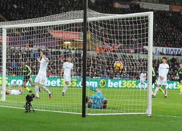 Arsenal's Iwobi Scores Deflected Goal Past Former Team-Mate Fabianski in Swansea Clash