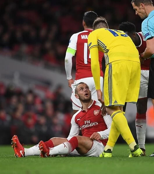 Arsenal's Jack Wilshere Confronts BATE Borisov's Nemanja Milunovic during Europa League Clash