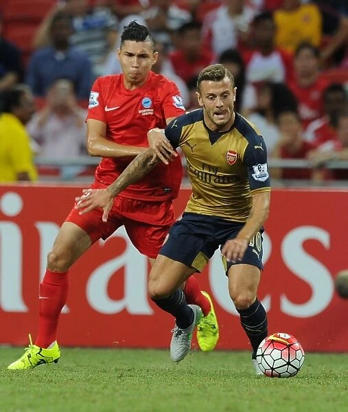 Arsenal's Jack Wilshere Stands Firm Against Singapore XI in Barclays Asia Trophy