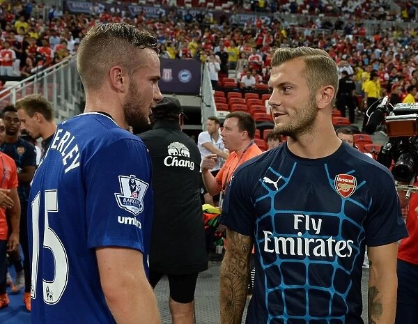 Arsenal's Jack Wilshere and Tom Cleverley Share Pre-Match Conversation Before Arsenal v Singapore XI, 2015