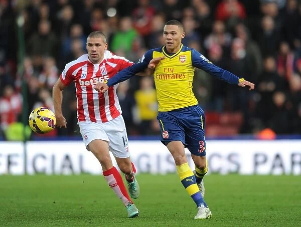 Arsenal's Kieran Gibbs Outsmarts Jonathan Walters: A Footballing Masterclass from the Stoke vs. Arsenal Match (2014-15)