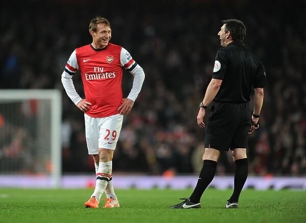 Arsenal's Kim Kallstrom Argues with Referee Lee Probert During Arsenal v Swansea City Match