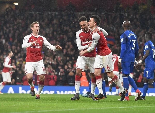 Arsenal's Koscielny, Aubameyang, and Monreal Celebrate Goal Against Everton (2017-18)