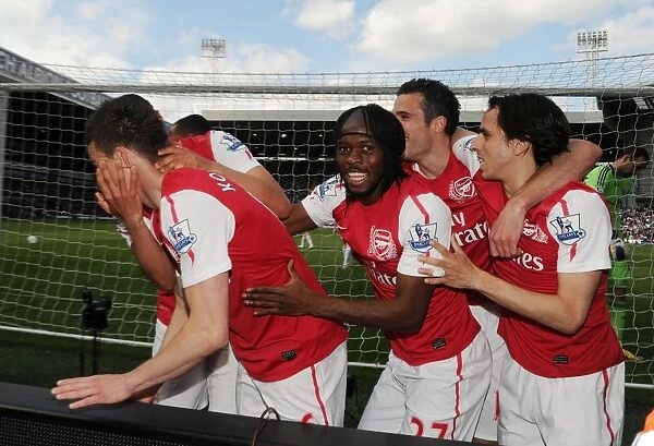 Arsenal's Koscielny, Benayoun, Gervinho, and Coquelin Celebrate Goals Against West Bromwich Albion (2011-12)