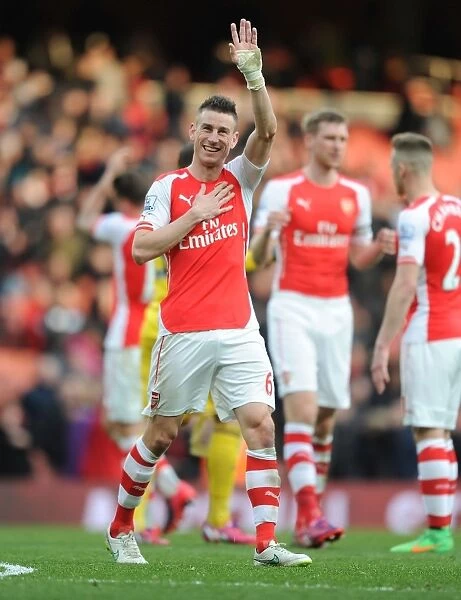 Arsenal's Koscielny Celebrates Goal Against West Ham in Premier League 2014-2015