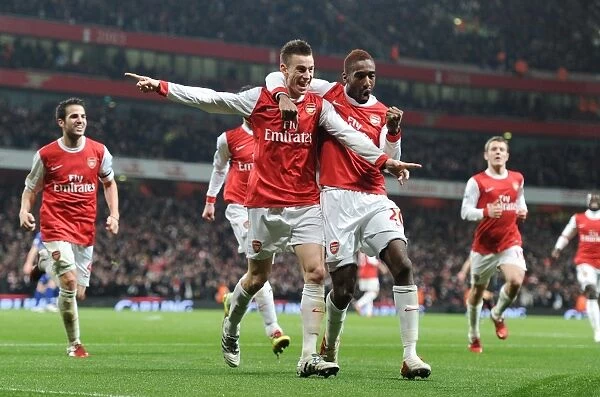 Arsenal's Koscielny, Djourou, and Fabregas: Celebrating the Second Goal in Carling Cup Semi-Final Victory over Ipswich Town (3:0, 3:1 agg)