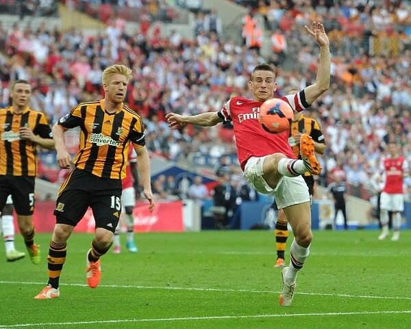 Arsenal's Koscielny Fends Off Hull's McShane in FA Cup Final Showdown