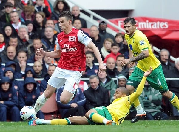 Arsenal's Koscielny Fouls by Norwich's Jackson in 2012 Premier League Clash
