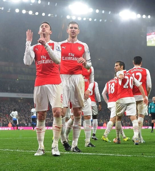 Arsenal's Koscielny and Mertesacker Celebrate Goal Against Newcastle United (2015-16)