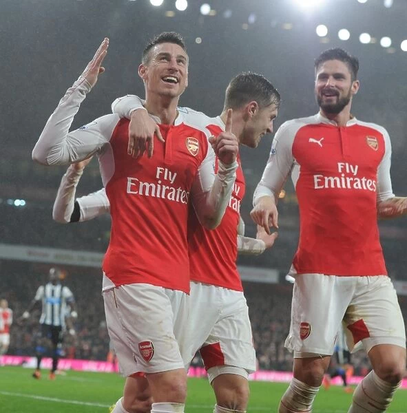 Arsenal's Koscielny, Ramsey, and Giroud Celebrate Goal Against Newcastle United (2015-16)