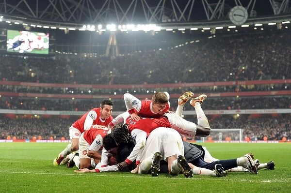 Arsenal's Koscielny and Teammates Celebrate 2nd Goal Against Everton, 2011