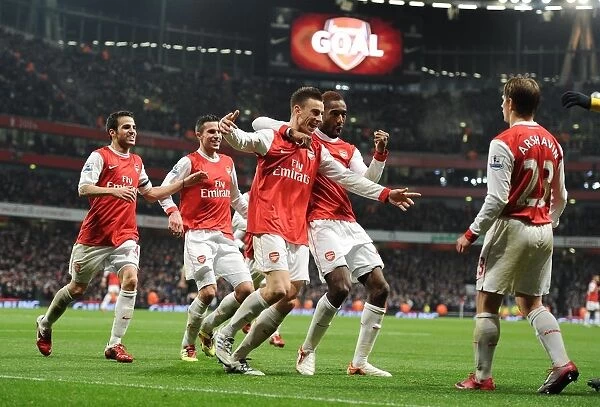 Arsenal's Koscielny and Teammates Celebrate Carling Cup Semi-Final Victory over Ipswich (3-0, 3-1 agg)