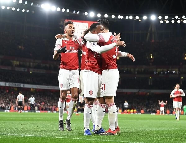 Arsenal's Lacazette, Aubameyang, and Kolasinac Celebrate Goals Against Newcastle United (April 2019)