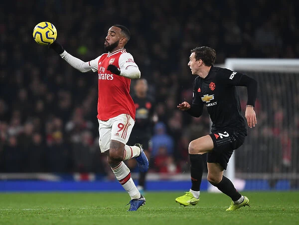 Arsenal's Lacazette Clashes with Manchester United's Lindelof in Premier League Showdown