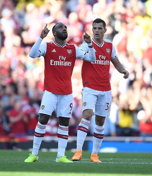 Arsenal's Lacazette and Xhaka Celebrate Goal Against Tottenham in 2019-20 Premier League
