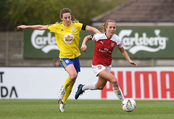 Arsenal's Lia Walti Clashes with Birmingham's Chloe Arthur in WSL Action
