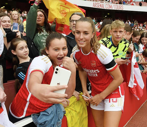 Arsenal's Lia Walti and Young Fan Share a Selfie after Arsenal Women vs Liverpool Women (2023-24) Barclays Super League Match at Emirates Stadium