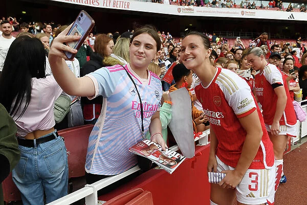 Arsenal's Lotte Wubben-Moy and Young Fan Share a Moment after Arsenal Women vs Liverpool Women Match at Emirates Stadium (2023-24)