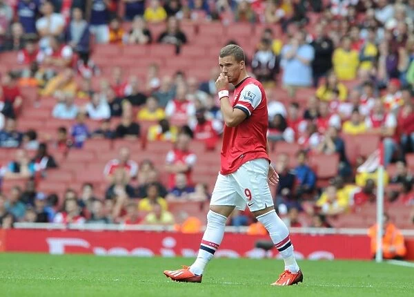 Arsenal's Lukas Podolski in Action against Aston Villa (2013-14 Premier League)