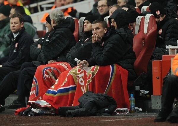 Arsenal's Lukas Podolski Faces Off Against West Ham in Premier League Showdown