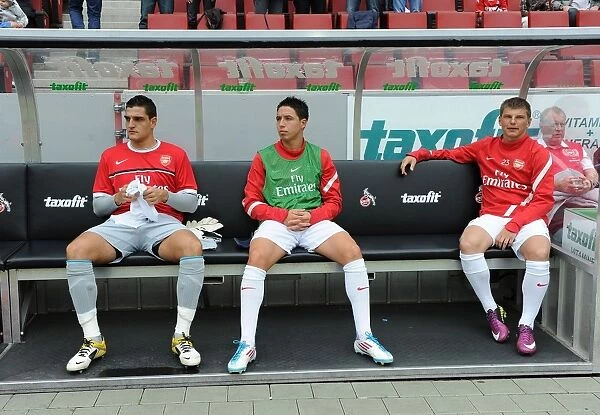 Arsenal's Mannone, Nasri, and Arshavin in Action during Cologne Friendly