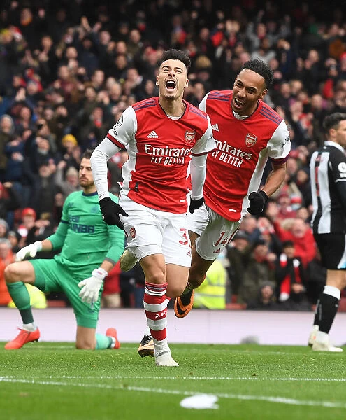 Arsenal's Martinelli and Aubameyang: Celebrating a Hard-Fought 2-1 Victory Over Newcastle United (Premier League 2021-22)