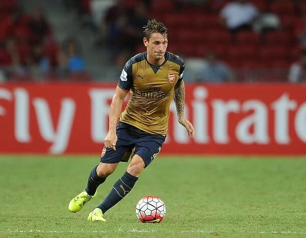 Arsenal's Mathieu Debuchy in Action at 2015 Barclays Asia Trophy vs Singapore XI