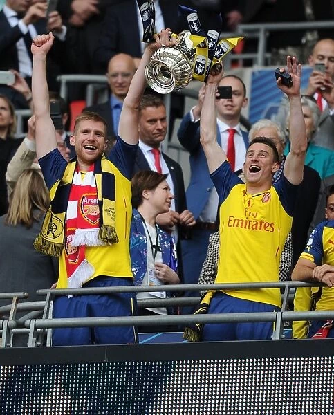 Arsenal's Mertesacker and Koscielny Celebrate FA Cup Victory