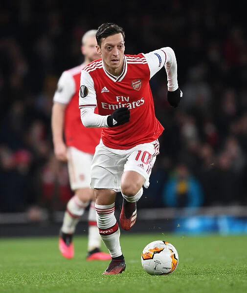 Arsenal's Mesut Ozil in Europa League Action against Olympiacos at Emirates Stadium