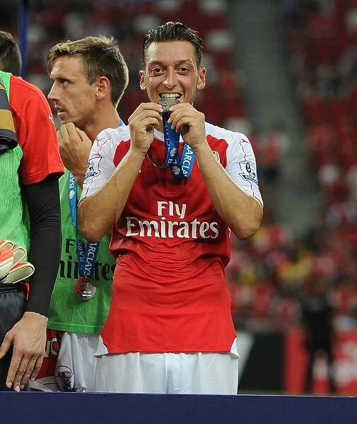 Arsenal's Mesut Ozil Leads the Team to Asia Trophy Victory over Everton