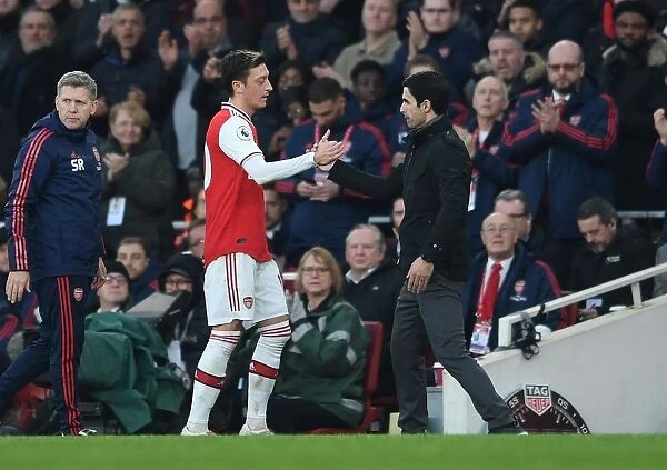 Arsenal's Mikel Arteta and Mesut Ozil Share a Moment Amidst Arsenal FC vs Chelsea FC Rivalry, Premier League 2019-20