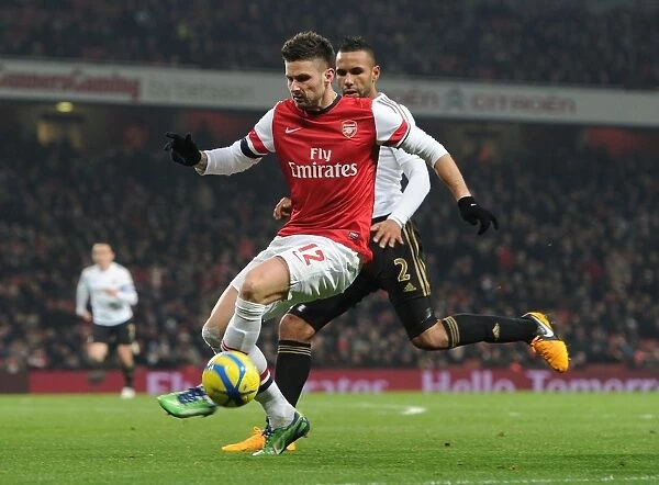 Arsenal's Olivier Giroud Clashes with Swansea's Kyle Bartley in FA Cup Third Round Replay
