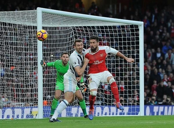 Arsenal's Olivier Giroud Faces Off Against West Brom's Gareth McAuley in Premier League Clash