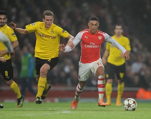 Arsenal's Oxlade-Chamberlain Clashes with Dortmund's Bender in Champions League Showdown