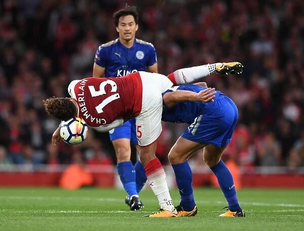 Arsenal's Oxlade-Chamberlain Faces Off Against Leicester's James in Intense Premier League Clash at Emirates Stadium