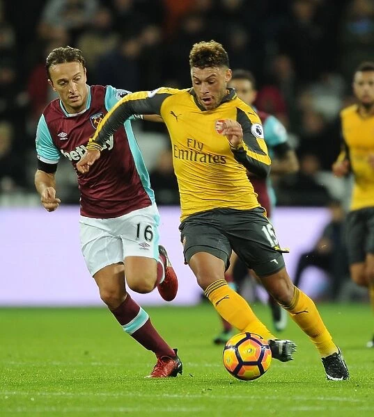 Arsenal's Oxlade-Chamberlain Outmaneuvers West Ham's Noble in Premier League Clash