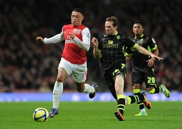 Arsenal's Oxlade-Chamberlain Outsmarts Leeds White in FA Cup Showdown