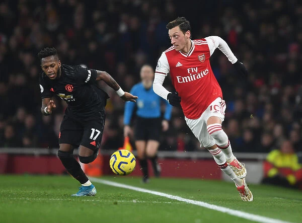 Arsenal's Ozil Outwits Manchester United's Fred: A Premier League Showdown
