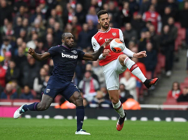 Arsenal's Pablo Mari Battles Michail Antonio: Intense Moment from Arsenal v West Ham Clash