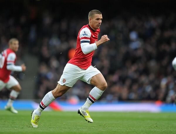 Arsenal's Podolski in Action: Arsenal vs. Queens Park Rangers, 2012-13 Premier League