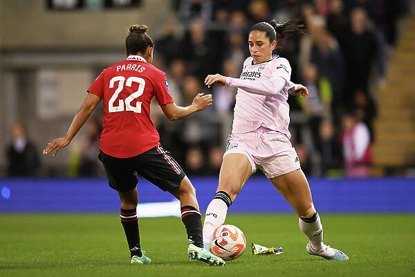 Arsenal's Rafaelle Souza Fends Off Manchester United's Nikita Parris in FA Women's Super League Clash