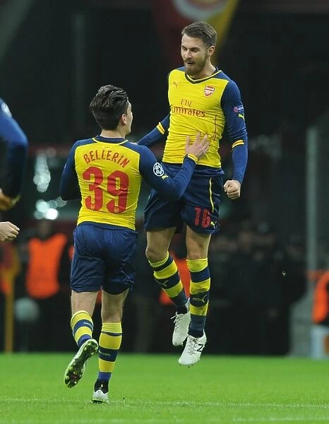 Arsenal's Ramsey and Bellerin Celebrate Goal Against Galatasaray in Champions League