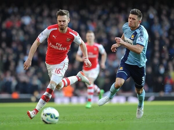 Arsenal's Ramsey Clashes with West Ham's Creswell in Premier League Showdown