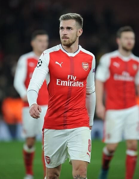 Arsenal's Ramsey Faces Off Against Paris Saint-Germain in Champions League Showdown