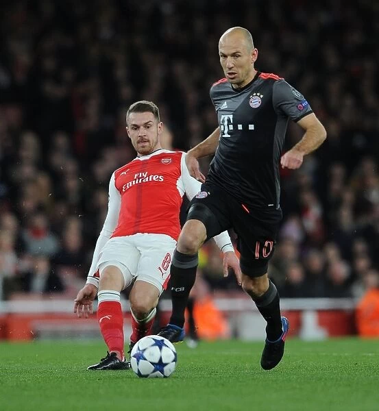 Arsenal's Ramsey Faces Off Against Robben in Champions League Showdown