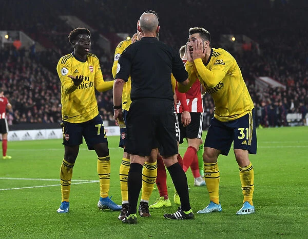 Arsenal's Reaction: Bukayo Saka and Sead Kolasinac Dispute Referee's Call at Sheffield United