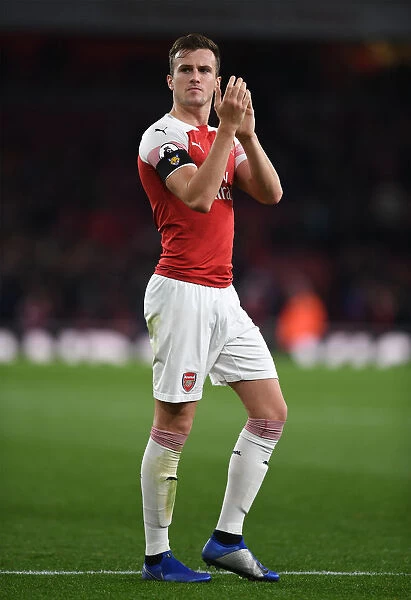 Arsenal's Rob Holding Celebrates with Fans after Arsenal vs Liverpool Match