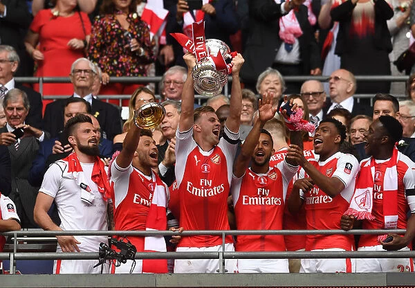 Arsenal's Rob Holding Lifts FA Cup after Arsenal v Chelsea Final Victory