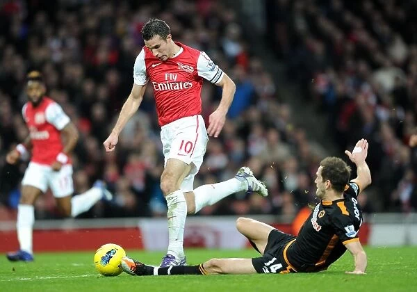Arsenal's Robin van Persie Battles Roger Johnson in 2011-2012 Premier League Clash